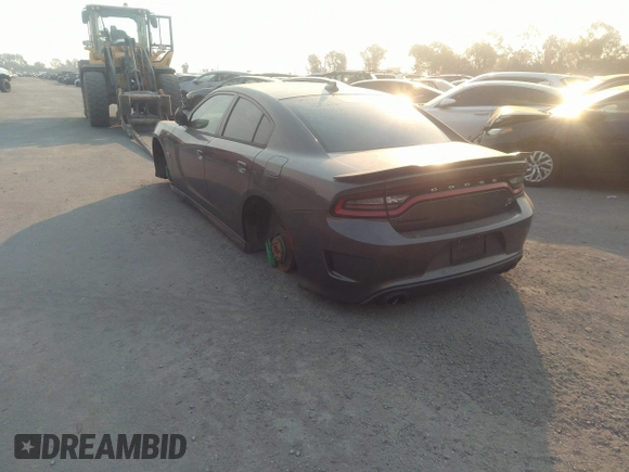 2019 Dodge Charger Scat Pack with VIN 2C3CDXGJ2KH564051, listed as a IAAI auction lot 41255283 with 64,687 mi miles and . Bid and sale history available at DreamBid. Image 3.