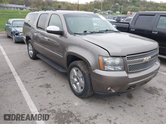 2011 Chevrolet Suburban LTZ with VIN 1GNSKKE32BR197356, listed as a IAAI auction lot 42052377 with 248,574 mi miles and . Bid and sale history available at DreamBid. Image 1.