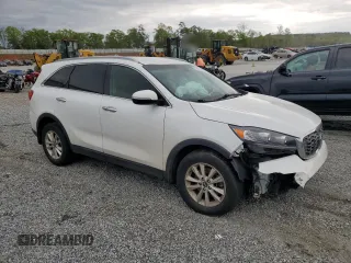 2020 Kia Sorento LX z VIN 5XYPG4A31LG698806, wystawiony jako Copart lot #52627055 z przebiegiem 107 023 mil mil oraz Szkoda całkowita • Salvage title. Historia ofert i sprzedaży dostępna na DreamBid. Obrazek 4.