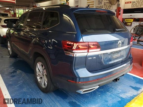 2023 Volkswagen Atlas SE z VIN 1V2HR2CA5PC527628, wystawiony jako IAAI lot #42569146 z przebiegiem 27 424 mil mil oraz . Historia ofert i sprzedaży dostępna na DreamBid. Obrazek 4.