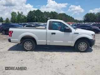 2018 Ford F-150 XL z VIN 1FTMF1CB6JFD18318, wystawiony jako IAAI lot #42637066 z przebiegiem 167 834 mil mil oraz . Historia ofert i sprzedaży dostępna na DreamBid. Obrazek 13.