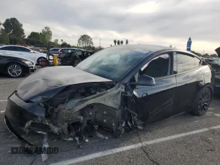2022 Tesla Model Y Performance with VIN 7SAYGDEF9NF455508, listed as a Copart auction lot 51517205 with Not provided miles and Salvage title. Bid and sale history available at DreamBid. Image 1.