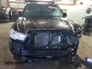 2023 Toyota Tacoma SR z VIN 3TYRZ5CN0PT032427, wystawiony jako Copart lot #87620985 z przebiegiem 32 010 mil mil oraz Szkoda całkowita • Salvage title. Historia ofert i sprzedaży dostępna na DreamBid. Obrazek 5.