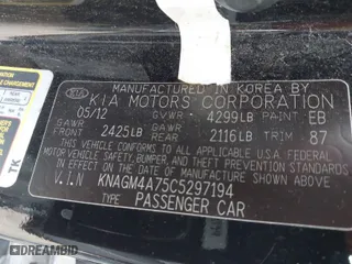 2012 Kia Optima LX with VIN KNAGM4A75C5297194, listed as a IAAI auction lot 41816301 with 119,064 mi miles. Bid and sale history available at carsss.com. Image 9.