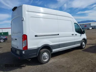 2023 Ford Transit Cargo with VIN 1FTBR2X87PKA70597, listed as a IAAI auction lot 41896133 with 37,982 mi miles and . Bid and sale history available at DreamBid. Image 4.