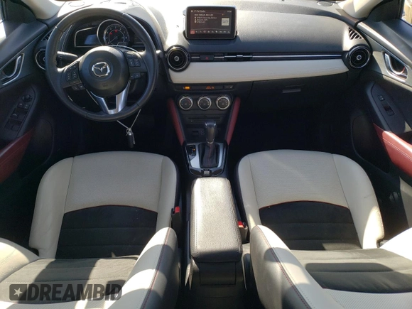2016 Mazda CX-3 Grand Touring z VIN JM1DKBD7XG0107274, wystawiony jako Copart lot #52137385 z przebiegiem 35 376 mil mil oraz Szkoda całkowita • Salvage title. Historia ofert i sprzedaży dostępna na DreamBid. Obrazek 8.