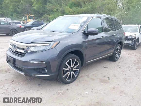 2020 Honda Pilot Elite with VIN 5FNYF6H00LB027472, listed as a IAAI auction lot 42253478 with 69,988 mi miles and . Bid and sale history available at DreamBid. Image 21.