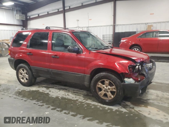 2007 Ford Escape XLT with VIN 1FMYU03Z27KA05874, listed as a Copart auction lot 73295564 with 127,088 mi miles and Salvage Title. Bid and sale history available at carsss.com. Image 4.