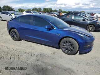 2023 Tesla Model 3 z VIN 5YJ3E1EA2PF627302, wystawiony jako Copart lot #56535485 z przebiegiem 30 522 mil mil oraz Szkoda całkowita • Salvage title. Historia ofert i sprzedaży dostępna na DreamBid. Obrazek 4.