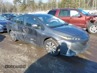 2021 Toyota Prius LE with VIN JTDKAMFP0M3187116, listed as a IAAI auction lot 41678273 with 75,086 mi miles and . Bid and sale history available at DreamBid. Image 1.