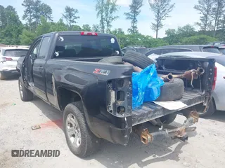 2016 Chevrolet Silverado 1500 LT with VIN 1GCVKREC4GZ326414, listed as a IAAI auction lot 42225681 with Not Provided miles and . Bid and sale history available at DreamBid. Image 3.