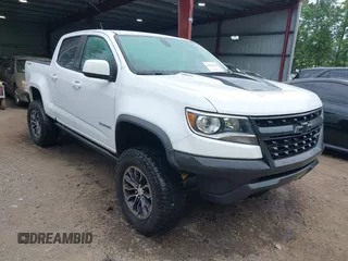 2019 Chevrolet Colorado 4WD ZR2 z VIN 1GCPTEE13K1166594, wystawiony jako IAAI lot #42374128 z przebiegiem 127 889 mil mil oraz . Historia ofert i sprzedaży dostępna na DreamBid. Obrazek 1.