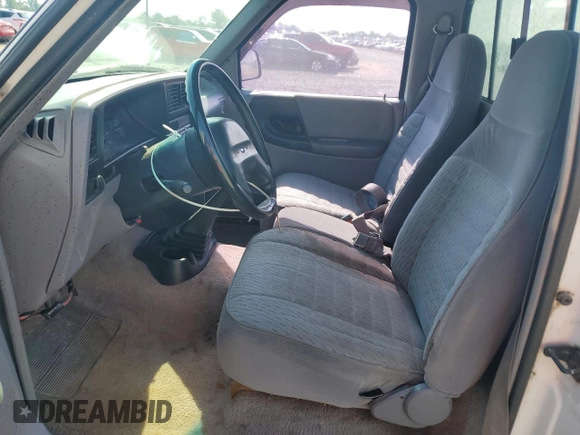 1994 Ford Ranger Splash with VIN 1FTCR10A9RPC04494, listed as a Copart auction lot 61871005 with 197,454 mi miles and Salvage title. Bid and sale history available at DreamBid. Image 7.