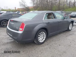 2014 Chrysler 300 with VIN 2C3CCAAG7EH377454, listed as a IAAI auction lot 41964310 with 277,209 mi miles. Bid and sale history available at carsss.com. Image 4.