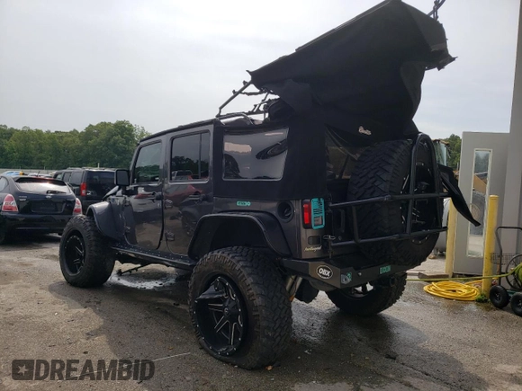 2016 Jeep Wrangler Unlimited Rubicon Hard Rock with VIN 1C4BJWFG4GL188382, listed as a Copart auction lot 60615403 with 39,629 mi miles and Salvage Title. Bid and sale history available at carsss.com. Image 2.