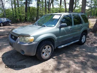 2007 Ford Escape XLS with VIN 1FMCU92ZX7KA59665, listed as a IAAI auction lot 42124248 with 169,211 mi miles and . Bid and sale history available at DreamBid. Image 2.