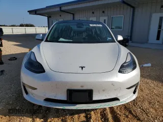 2022 Tesla Model 3 with VIN 5YJ3E1EA7NF184741, listed as a Copart auction lot 82487494 with 133,215 mi miles and Clean Title. Bid and sale history available at DreamBid. Image 5.