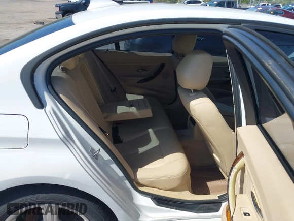 2014 BMW 3 Series 320i with VIN WBA3B1G53ENT00444, listed as a IAAI auction lot 42082984 with 94,401 mi miles. Bid and sale history available at carsss.com. Image 8.