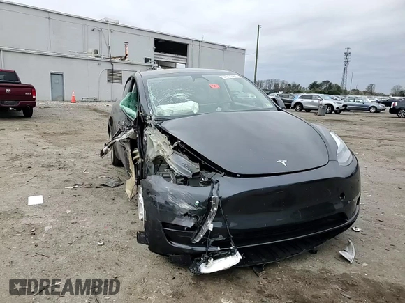 2024 Tesla Model Y с VIN 7SAYGDED1RF092027, выставлен на аукционе Copart как лот 51655485 с пробегом 22 010 миль миль и Списание • Salvage title. История ставок и продаж доступна на DreamBid. Изображение 11.