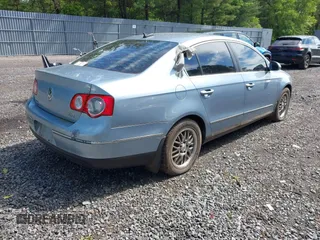 2006 Volkswagen Passat Value Edition z VIN WVWAK73C06P141096, wystawiony jako IAAI lot #42297811 z przebiegiem 84 399 mil mil oraz . Historia ofert i sprzedaży dostępna na DreamBid. Obrazek 4.