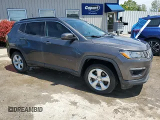2018 Jeep Compass Latitude z VIN 3C4NJCBB0JT134143, wystawiony jako Copart lot #57228345 z przebiegiem 102 011 mil mil oraz Szkoda całkowita • Salvage title. Historia ofert i sprzedaży dostępna na DreamBid. Obrazek 4.