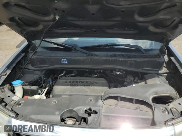 2012 Honda Pilot EX-L with VIN 5FNYF4H54CB019973, listed as a Copart auction lot 64614135 with 102,352 mi miles and Salvage title. Bid and sale history available at DreamBid. Image 12.