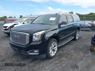 2017 GMC Yukon XL Denali with VIN 1GKS2HKJ4HR384139, listed as a IAAI auction lot 40239513 with 103,603 mi miles. Bid and sale history available at carsss.com. Image 2.