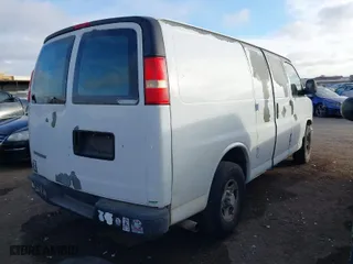 2007 Chevrolet Express Cargo Van with VIN 1GCFG15X571149672, listed as a IAAI auction lot 41194974 with 255,757 mi miles. Bid and sale history available at carsss.com. Image 4.