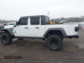 2020 Jeep Gladiator Sport S z VIN 1C6HJTAG0LL129461, wystawiony jako IAAI lot #41464713 z przebiegiem 66 625 mil mil oraz . Historia ofert i sprzedaży dostępna na DreamBid. Obrazek 14.