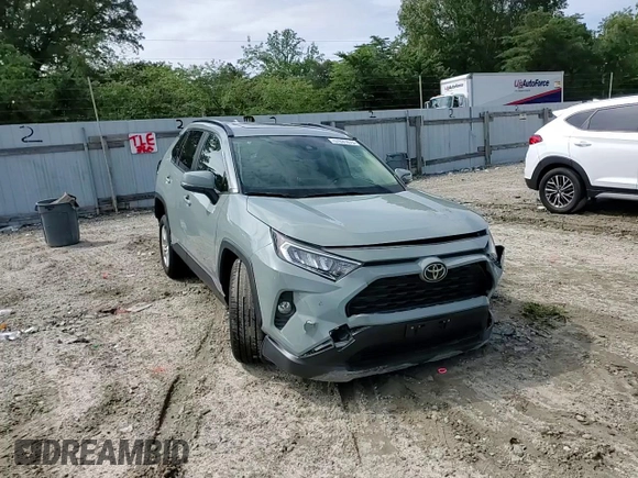 2019 Toyota RAV4 XLE with VIN JTMP1RFV6KD024642, listed as a Copart auction lot 57631075 with 36,051 mi miles and Salvage title. Bid and sale history available at DreamBid. Image 14.