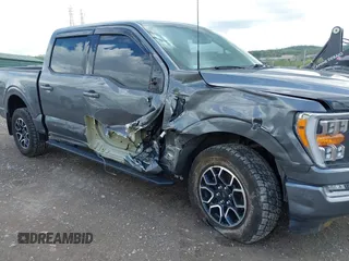 2021 Ford F-150 XL with VIN 1FTFW1E56MKE74015, listed as a IAAI auction lot 42172934 with 27,186 mi miles and . Bid and sale history available at DreamBid. Image 6.