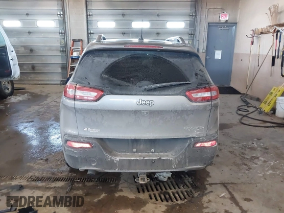 2015 Jeep Cherokee Limited with VIN 1C4PJLDB0FW505891, listed as a IAAI auction lot 41620674 with 120,804 mi miles and . Bid and sale history available at DreamBid. Image 16.