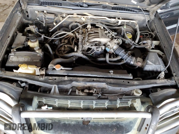 2002 Nissan Xterra XE with VIN 5N1ED28T62C534587, listed as a Copart auction lot 52828005 with 185,848 mi miles and Salvage title. Bid and sale history available at DreamBid. Image 12.