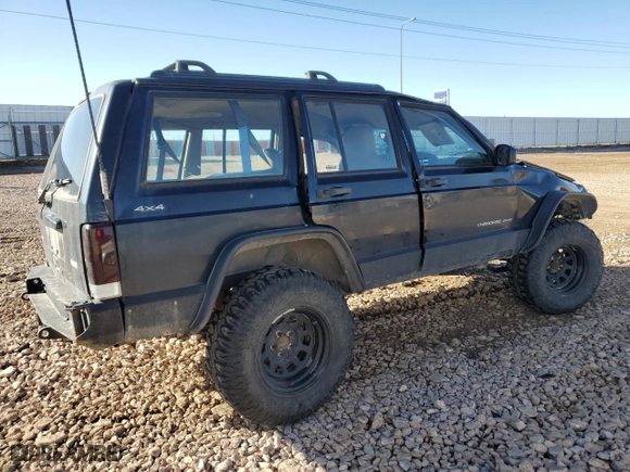 2000 Jeep Cherokee Police with VIN 1J4FF48S8YL103256, listed as a Copart auction lot 45959305 with 0 mi miles and Salvage Title. Bid and sale history available at carsss.com. Image 3.