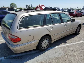 2000 Mercedes-Benz E-Class AWD with VIN WDBJH82J8YX042547, listed as a Copart auction lot 58063494 with 138,392 mi miles and Salvage Title. Bid and sale history available at carsss.com. Image 3.