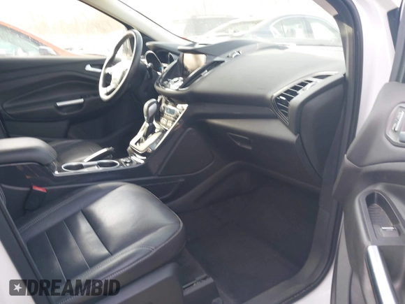 2015 Ford Escape Titanium with VIN 1FMCU9J98FUC76491, listed as a IAAI auction lot 41790638 with 158,196 mi miles and . Bid and sale history available at DreamBid. Image 5.