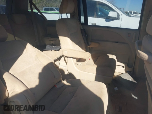 2006 Honda Odyssey EX with VIN 5FNRL38426B400952, listed as a IAAI auction lot 41346853 with 210,826 mi miles and . Bid and sale history available at DreamBid. Image 8.