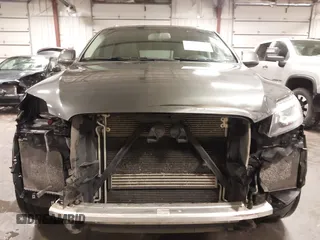 2015 Audi Q7 Premium Plus z VIN WA1LGAFE1FD023297, wystawiony jako IAAI lot #42128488 z przebiegiem 173 407 mil mil oraz . Historia ofert i sprzedaży dostępna na DreamBid. Obrazek 6.