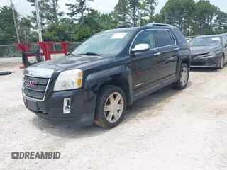 2011 GMC Terrain SLT-2 z VIN 2CTFLXE5XB6338129, wystawiony jako IAAI lot #42436704 z przebiegiem 154 300 mil mil oraz . Historia ofert i sprzedaży dostępna na DreamBid. Obrazek 2.