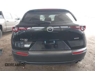 2025 Mazda CX-30 S Select Sport with VIN 3MVDMBBM3SM773819, listed as a IAAI auction lot 41584030 with 5,088 mi miles and . Bid and sale history available at DreamBid. Image 16.