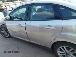 2015 Ford Focus SE z VIN 1FADP3F21FL348863, wystawiony jako IAAI lot #42401820 z przebiegiem 126 329 mil mil oraz . Historia ofert i sprzedaży dostępna na DreamBid. Obrazek 14.