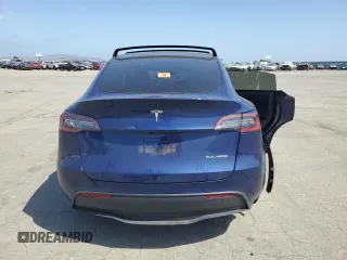 2023 Tesla Model Y Long Range with VIN 7SAYGAEE8PF927092, listed as a Copart auction lot 53917185 with 17,639 mi miles and Salvage Title. Bid and sale history available at DreamBid. Image 6.