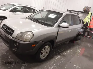 2007 Hyundai Tucson SE with VIN KM8JN12DX7U610529, listed as a IAAI auction lot 41370668 with 172,802 mi miles. Bid and sale history available at carsss.com. Image 2.