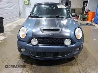 2010 MINI Convertible S z VIN WMWMS3C52ATY50861, wystawiony jako Copart lot #55620135 z przebiegiem 214 734 mil mil oraz Szkoda całkowita • Salvage title. Historia ofert i sprzedaży dostępna na DreamBid. Obrazek 5.