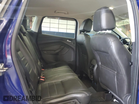 2013 Ford Escape SEL z VIN 1FMCU9HX7DUC87287, wystawiony jako Copart lot #61798475 z przebiegiem 147 521 mil mil oraz Czysty tytuł • Clean title. Historia ofert i sprzedaży dostępna na DreamBid. Obrazek 11.
