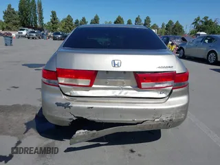 2003 Honda Accord LX z VIN JHMCM56363C033148, wystawiony jako IAAI lot #42261935 z przebiegiem 182 033 mil mil oraz . Historia ofert i sprzedaży dostępna na DreamBid. Obrazek 17.