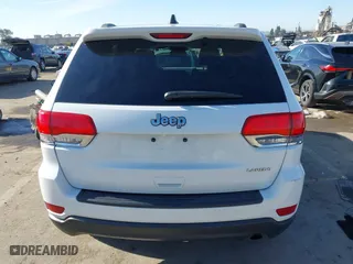 2014 Jeep Grand Cherokee Laredo with VIN 1C4RJEAGXEC130399, listed as a IAAI auction lot 41861664 with 106,925 mi miles. Bid and sale history available at carsss.com. Image 16.