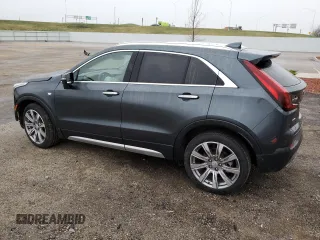 2021 Cadillac XT4 AWD Premium Luxury with VIN 1GYFZDR43MF057481, listed as a Copart auction lot 80966804 with 52,339 mi miles and Salvage Title. Bid and sale history available at carsss.com. Image 2.