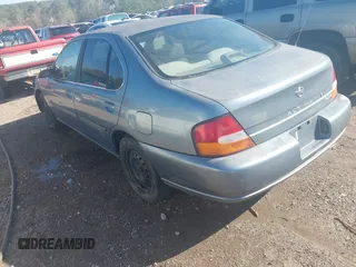1999 Nissan Altima XE with VIN 1N4DL01D1XC224886, listed as a IAAI auction lot 41813614 with 236,373 mi miles. Bid and sale history available at carsss.com. Image 3.