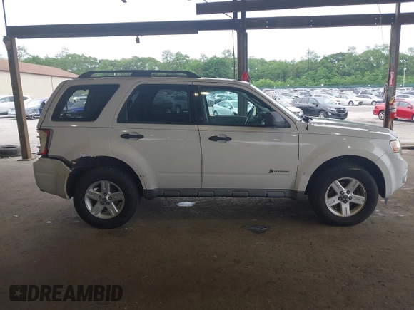 2009 Ford Escape Hybrid with VIN 1FMCU59399KC34999, listed as a IAAI auction lot 42515815 with 201,130 mi miles and . Bid and sale history available at DreamBid. Image 13.